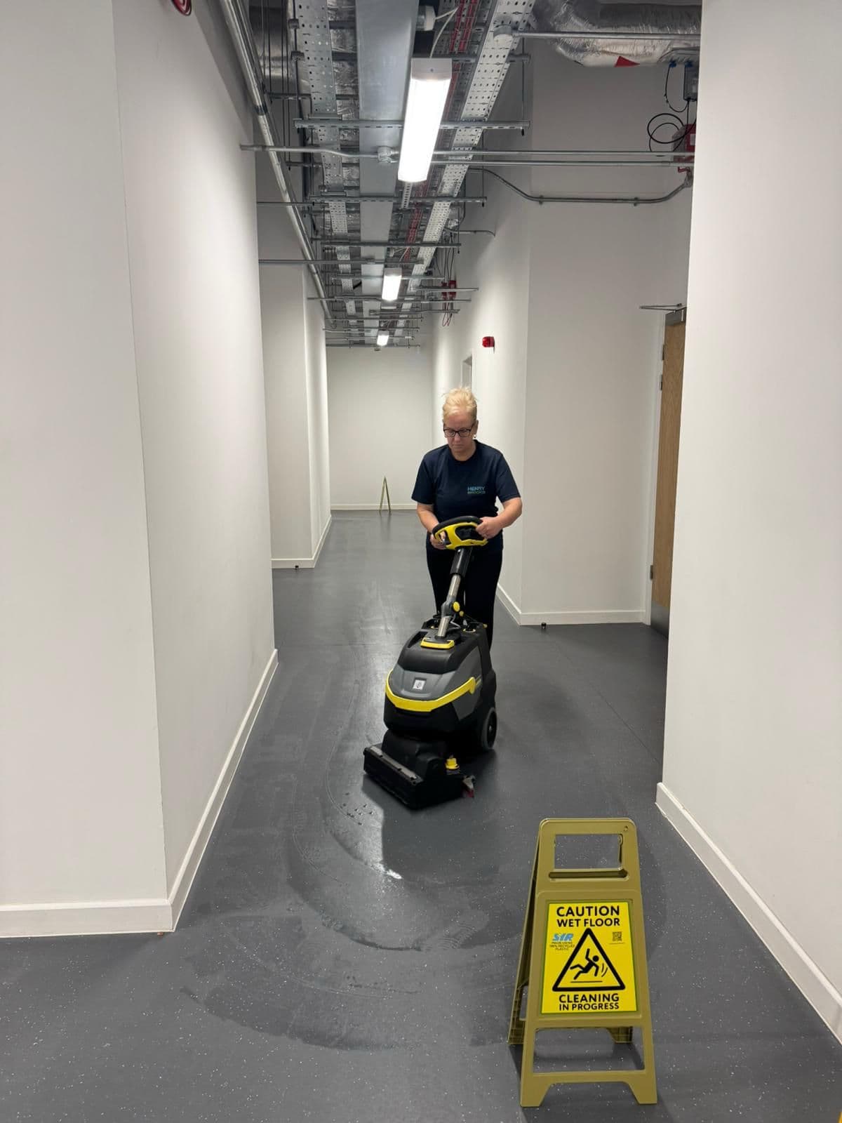 Henry-Brooks Ltd commercial cleaning team cleaning an office in Hampshire